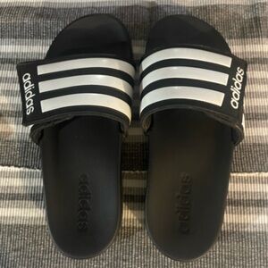 adidas Kids Black and White Slide Sandals.